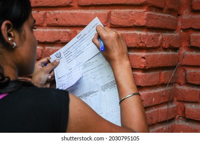 New Delhi, India-Sep 1 2019: Student Filling Admission Form And Submitting It At Window Of Indira Gandhi National Open University (IGNOU), Central Open Learning University Located In Delhi.