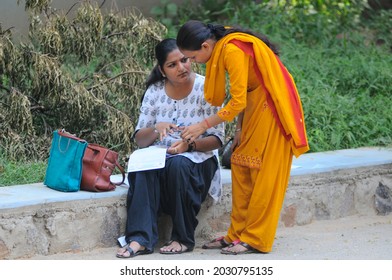 New Delhi, India-sep 1 2019: Female Student Filling Admission Form At The Indira Gandhi National Open University (IGNOU), Central Open Learning University Located At Maidan Garhi, New Delhi, India.