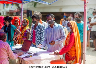 New Delhi, India-Sep 29 2021: Women In Queue For Registration At Free Covid Vaccination Centre, Special Vaccination Camp For Slum Dwellers At Vijay Ghat Yamuna Pushta In Delhi.