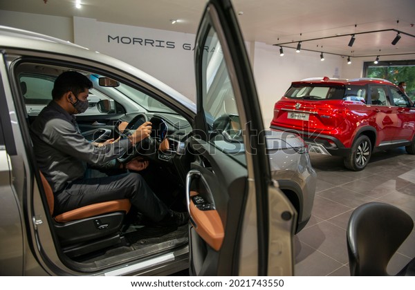 New Delhi, India-September 22 2020: Salesman\
at MG motor showroom in  New\
Delhi.