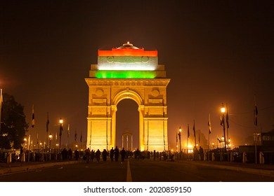 New Delhi, January 27, 2012: View of the famous India Gate building illuminated with the tricolour flag of India at night.