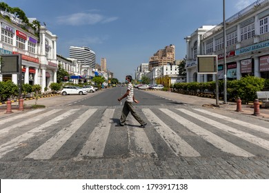 New Delhi, July 05, 2020: View Of A Man Wearing A Mask As He Crosses A Road At The Central Business District Of Connaught Place In New Delhi