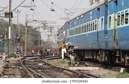 New Delhi-India, August 14, 2020: An Adult Man Jump From A Running Train New Delhi Railway Station In New Delhi, Rail Budget 