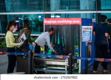 New Delhi/India May-25 , 2020 : Domestic Flights Resume After Lockdown In India , Airport Authority Sanitize The Luggage Before Entrance .