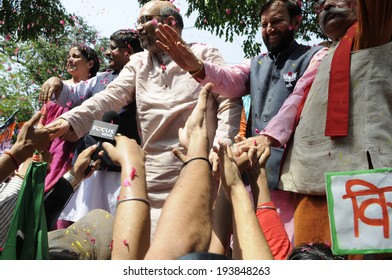 NEW DELHI-MAY 16:  Amit Shah,Ravi Shankar Prasad,Prakash Javadekar And Nirmala Sitaraman Shaking Hands With Supporters  After BJP Won The Indian National Election On May 16, 2014 In New Delhi ,India. 