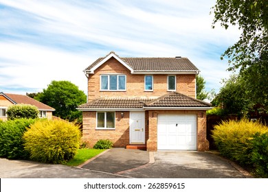 New detached house with garage - Powered by Shutterstock