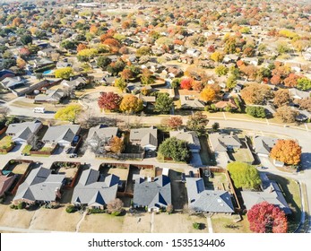 New Development Neighborhood Near Dallas, Texas With Colorful Orange Autumn Leaves. Row Of Two Story Single Family Dwelling With Large Backyard, Swimming Pool, Attached Garage And Wooden Fence Garden