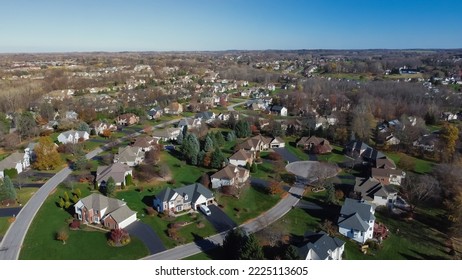 New Development Two Story Houses In Subdivision Sprawl With Cul-de-sac And Low-density Residential Property. Upscale Suburban Home With Large Lot Size And Green Grassy Lawn In Fall Season