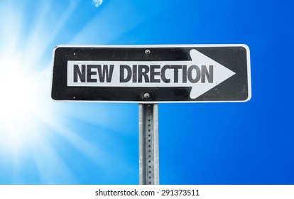 New Direction Direction Sign With A Beautiful Day