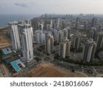 new district of Netanya in Israel on the shore of the Mediterranean Sea and the beach next to skyscrapers in Israel