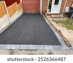 New driveway completed in front yard looking good with brick’s around the tarmac 