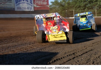 New Egypt, NJ, USA - June 23, 2021: Stock Car Racer Jordan Cox Leads Scott Maher Around The Clay Oval Track At New Jersey's New Egypt Speedway.