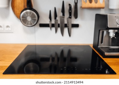 New Electric Stove With Induction Cooktop In Kitchen Top, Closeup. Bright And Modern Kitchen At The Bright Apartment 