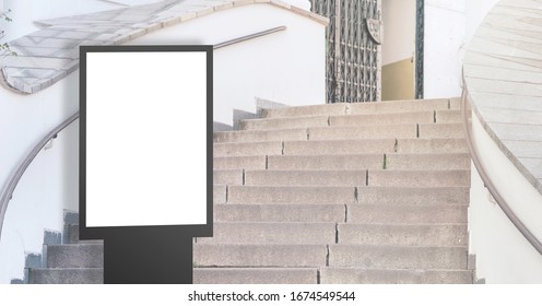 New Empty Citylight With Space For Advertisement On Stone Steps In Modern City Center On Spring Day