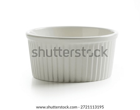 new empty small baking cup isolated on white background