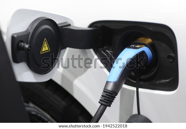 New energy Is electric power for cars\
Charging a new battery Future car\
transportation.