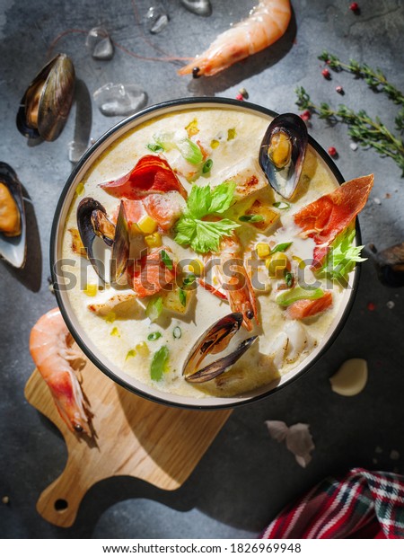 New England clam chowder, occasionally referred\
to as Boston or Boston-style Clam Chowder. Creamy soup with shrimp,\
corn, bacon and mussels.