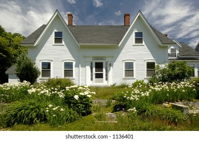 New England Country Home Surrounded By Gardens