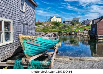 New England Fishing Village/Harbor. Small, Quiet Harbor With Wharf, Buildings, Boat.