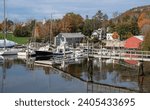 New England Harbor in Autumn:  Fall colors decorate the waterfront at a small coastal town in Maine.
