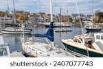 New England Harbor:  Yachts, fishing boats and sailing ships gather in Camden, Maine on an October afternoon.
