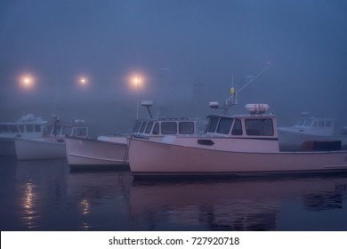 New England Maine Lobster Boat Fleet At Dock In The Night Fog