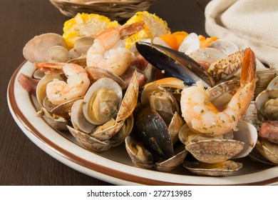 New England Style Clam Bake With Shrimp, Mussels And Corn On The Cob