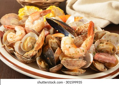 New England Style Clam Bake With Shrimp, Mussels, Corn And Potatoes