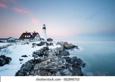 New England's iconic Portland Head Lighthouse in winter 