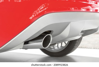 New Exhaust Of A Sports Car. Ecology Concept, Low Emission, Low Environmental Impact.