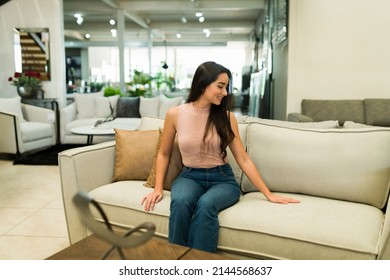 New furniture for my home. Happy customer smiling while shopping for furniture for her living room - Shutterstock ID 2144568637