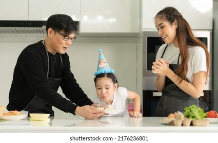 New Generation Asian Family Cook Together And Organize A Small Birthday Party For Our Little Daughter In The Kitchen Of The House