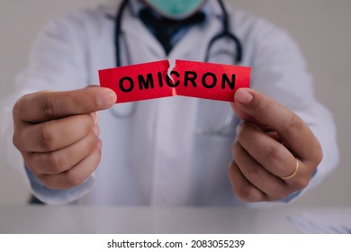 New Generation Vaccine Against Coronavirus South African Variant. Omicron Variant Of SARS-CoV-2. New B.1.1.529 Variant Of Concern. Doctor With A Stethoscope Tear The Red Paper With The Word Omicron.