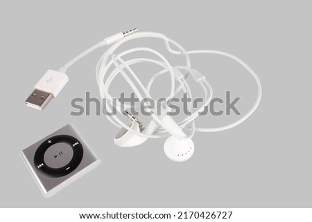 New gray Apple iPod Shuffle isolated on whitegray with clipping path