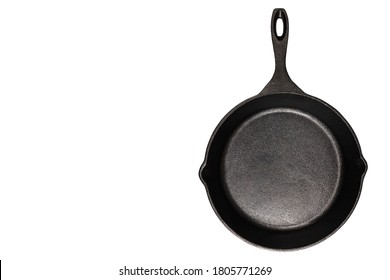 New Grill Metal Pan Isolated On White Background.
Empty Skillet Cast Iron Pan For Copy Space.
Top View.