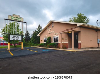 New Hartford, New York - Sep 6, 2022: Landscape Close Up View Of Bella Cucina Restaurant Exterior.