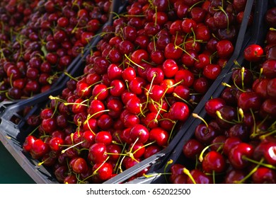 New harvest of fresh ripe red sweet cherry, street market in Italy, Sicily