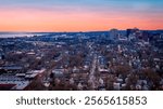 New Haven Connecticut Skyline at Dusk, downtown buildings and houses viewed from East Rock Park Summit at Sunset