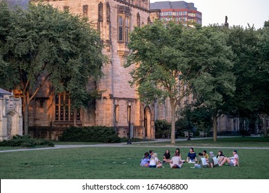 New Haven, CT / USA - 08.02.2017: Yale Students Sitting On The Grass At The Cross Campus