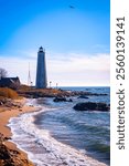 New Haven Lighthouse, built in 1847, at the Lighthouse Point Park of the Eastern Beachfront of New Haven Harbor in Connecticut, United States