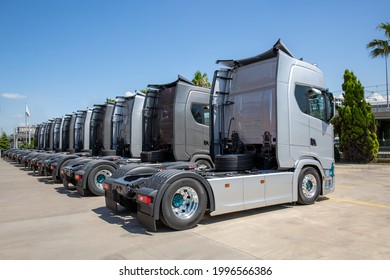 New heavy trucks in truck store, trucks lined up