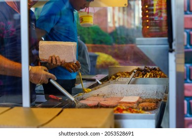 New Holland, PA, USA - September 30, 2021: Food Is Being Cooked At The Annual Community Street Fair In The Small Community In Lancaster County, PA.