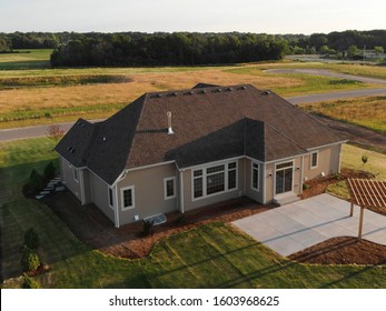 New Home Construction From Above. Aerial View Of Suburban House. American Neighborhood, Suburb. Summer, Sunny Day