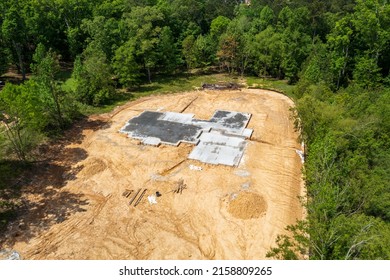New Home Construction Site With Concrete Foundation