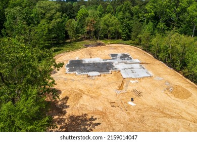 New Home Construction Site With Concrete Foundation