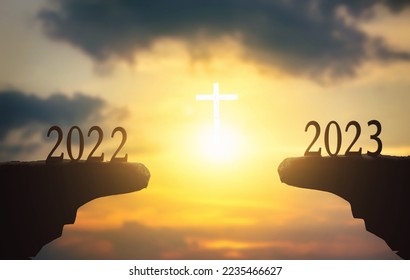New hope concept: 2023 on sunset sky background with white cross - Shutterstock ID 2235466627