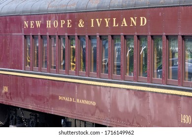 New Hope, PA / USA - April 26, 2020: The New Hope And Ivyland Railroad Runs Vintage Passengers Cars And Locomotives For It Family Excursion Service Along The Delaware River In Scenic Bucks County, PA.