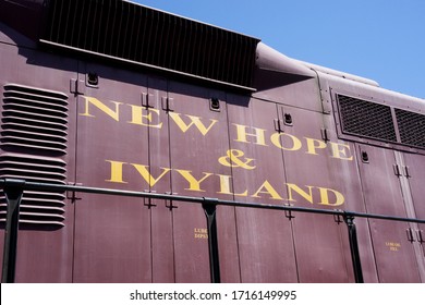 New Hope, PA / USA - April 26, 2020: The New Hope And Ivyland Railroad Runs Vintage Passengers Cars And Locomotives For It Family Excursion Service Along The Delaware River In Scenic Bucks County, PA.