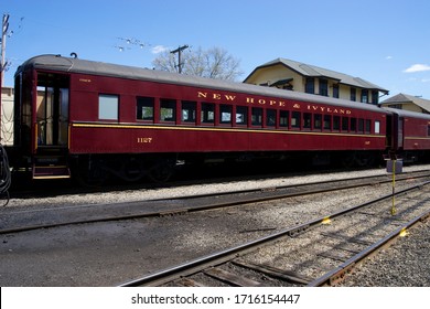 New Hope, PA / USA - April 26, 2020: The New Hope And Ivyland Railroad Runs Vintage Passenger Cars And Locomotives For Its Family Excursion Service Along The Delaware River In Scenic Bucks County, PA.