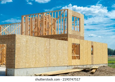 New House Building Under Construction On Sunny Day On Blue Sky Plywood Wall Wooden